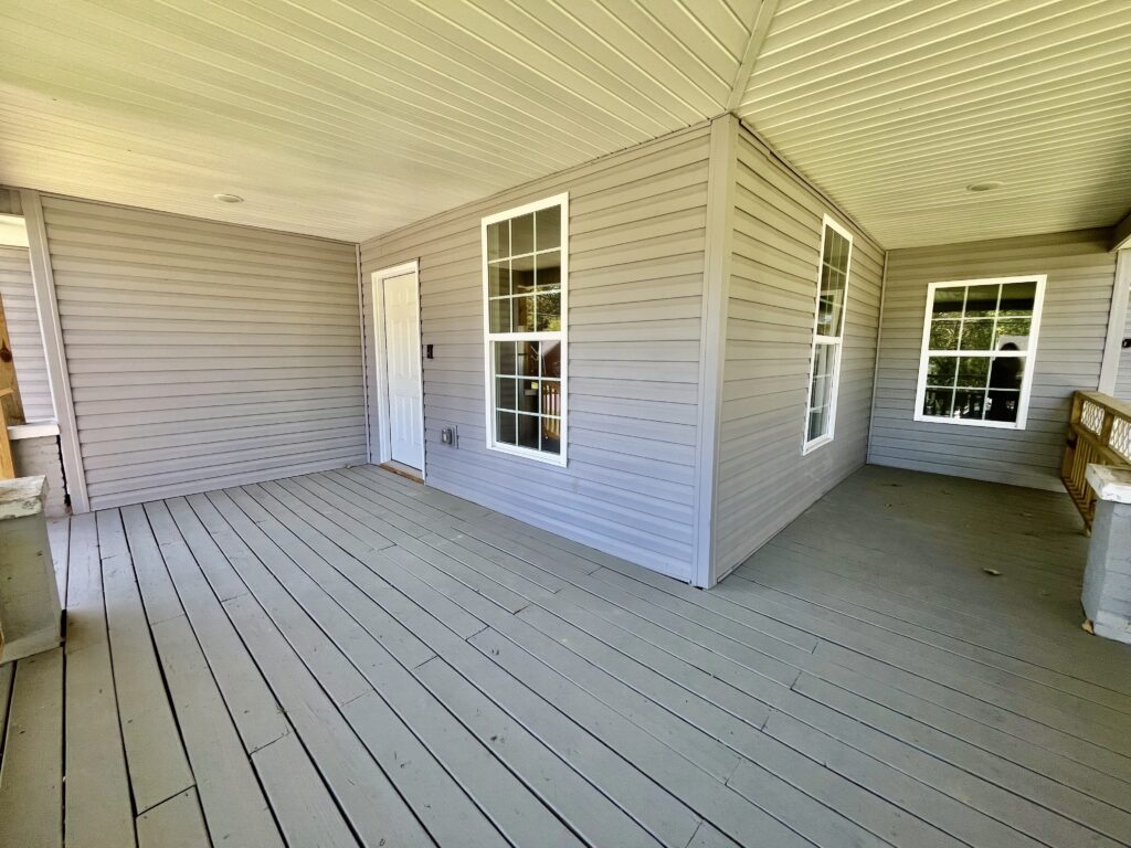 house with wooden deck on the entrance