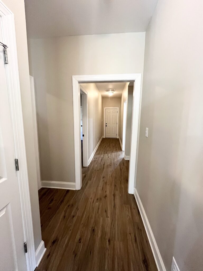 corridor in house leading to different rooms