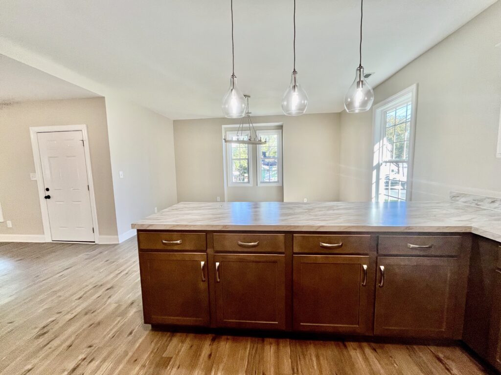 kitchen counter with racks and cabinets