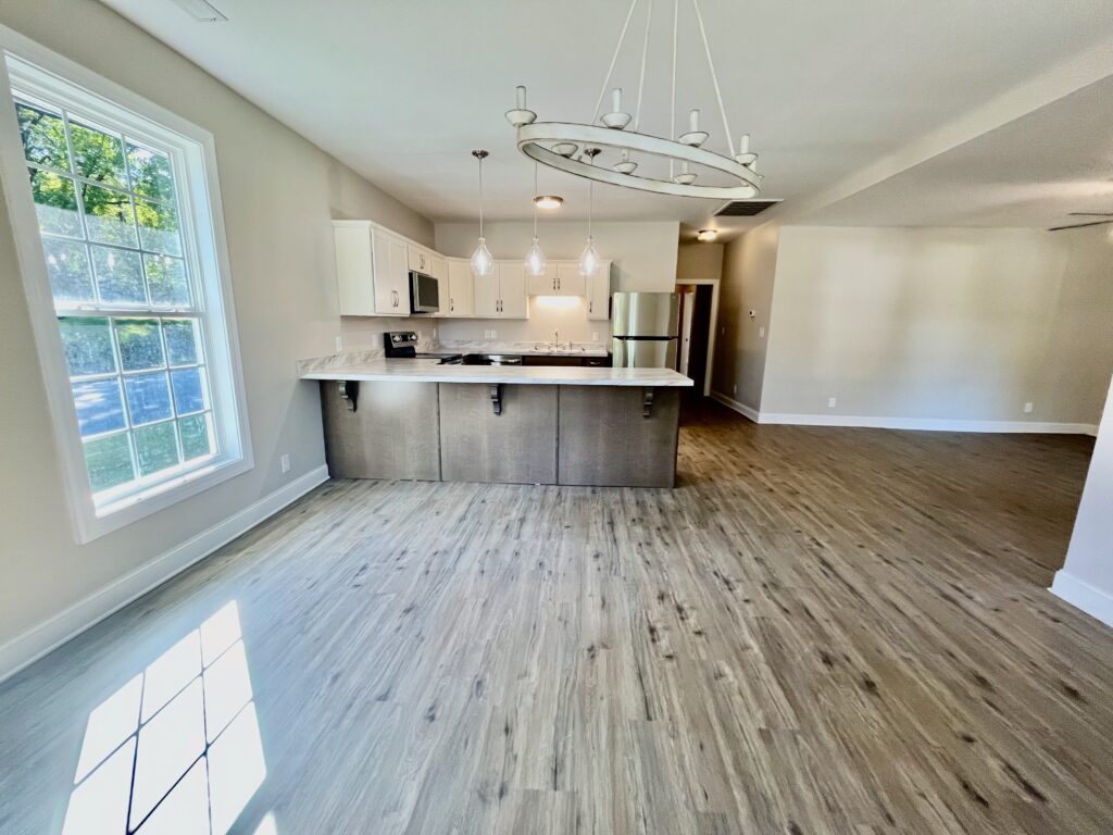 kitchen with fridge, microwave oven and cooking range