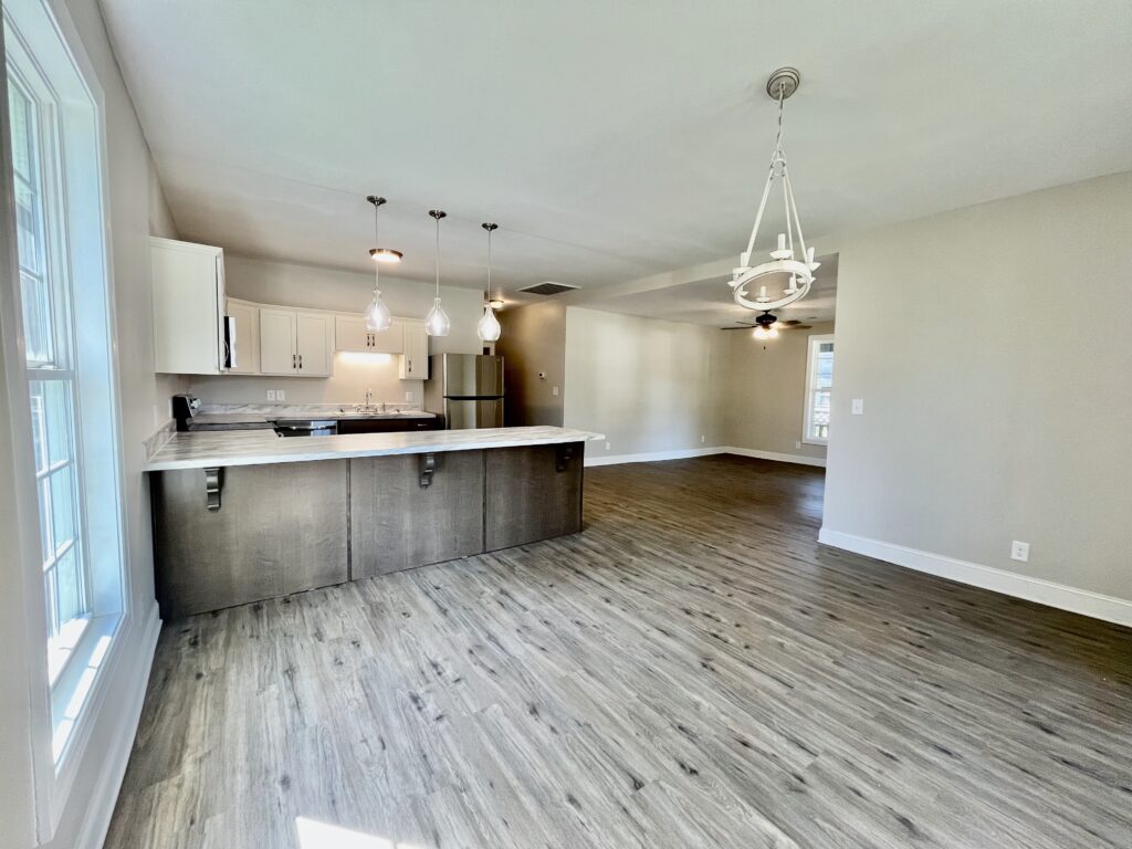 kitchen with fridge, microwave oven and cooking range
